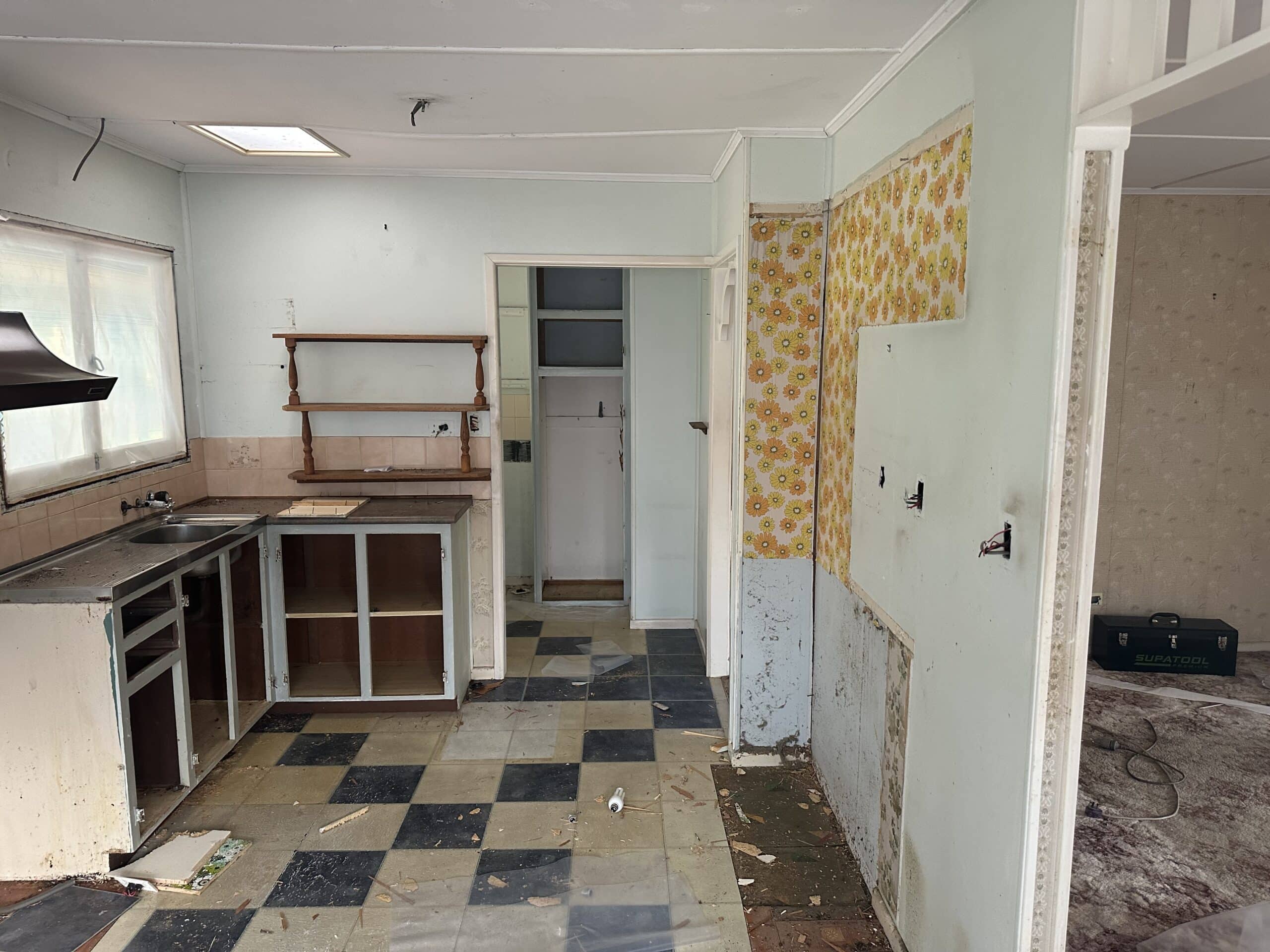 Asbestos-containing vinyl floor tiles identified during a building inspection.
