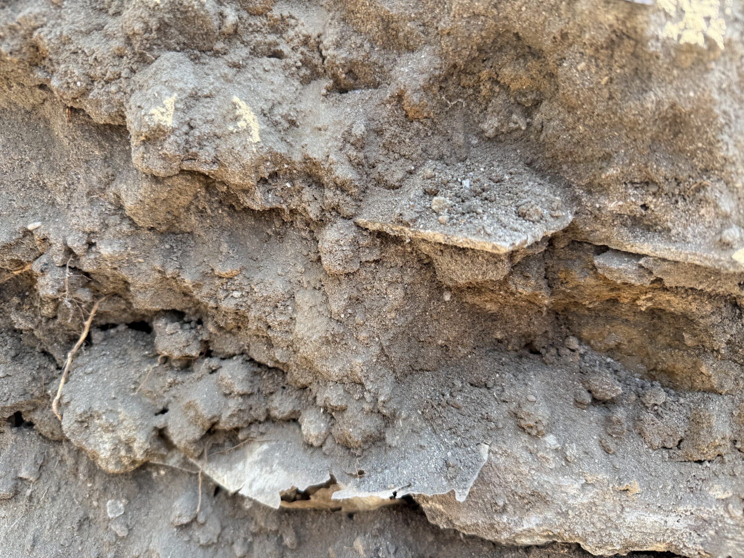 Asbestos material uncovered in soil during excavation