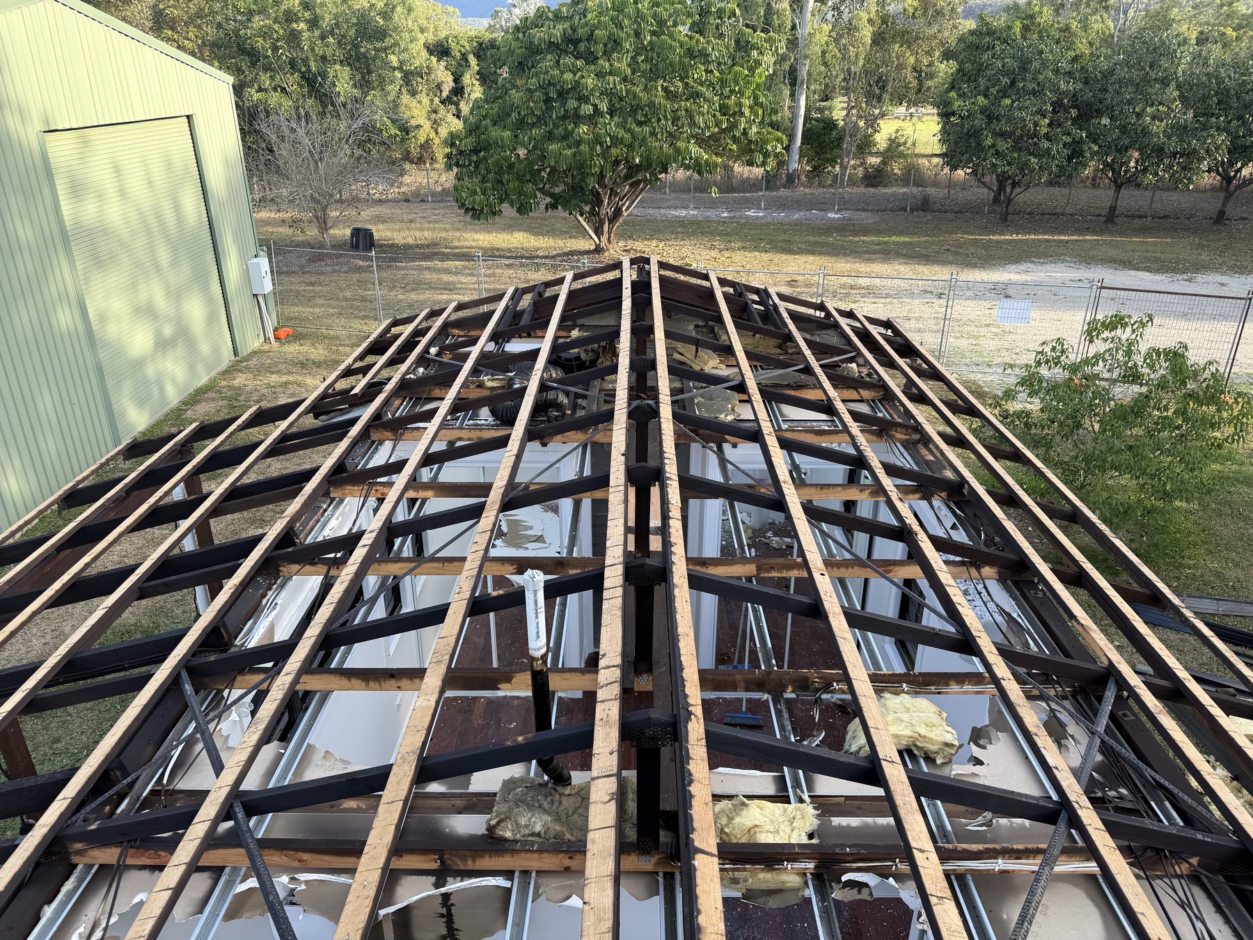 Roof sheeting removed to frame