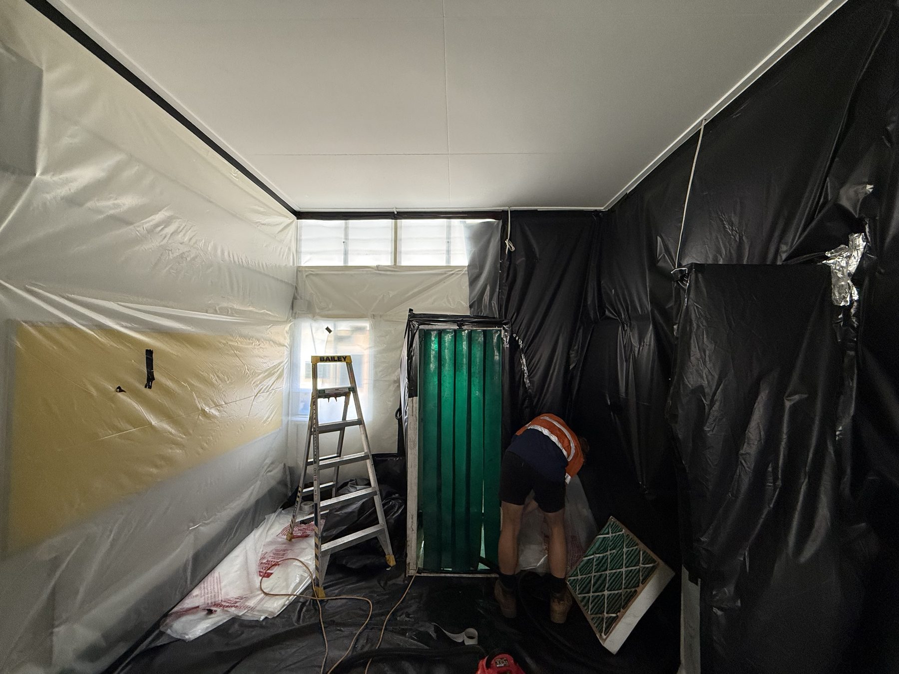 Three-stage decontamination unit
